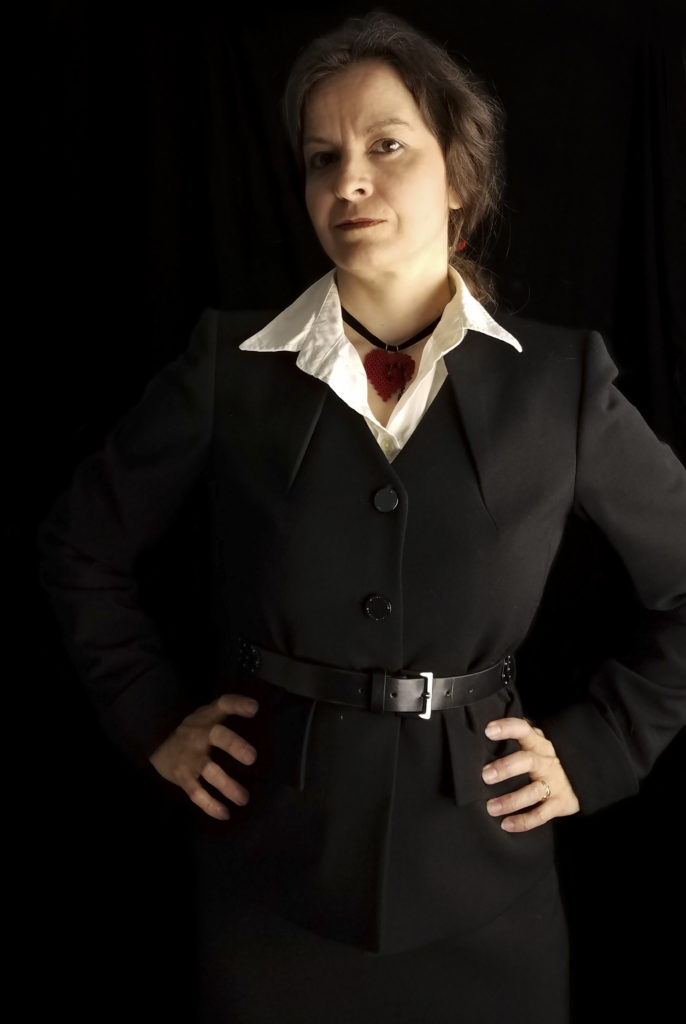 Bleeding Heart Pendant in red worn with Business Professional outfit
