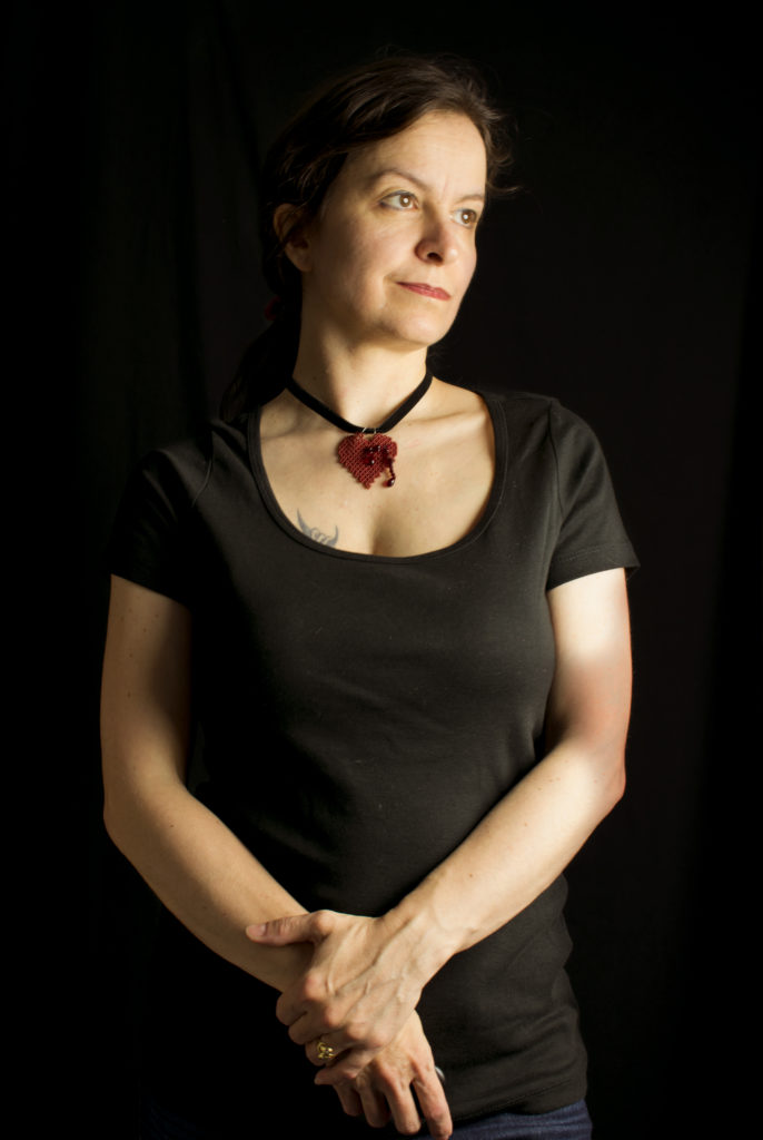 Bleeding Heart Pendant in red worn with Casual outfit